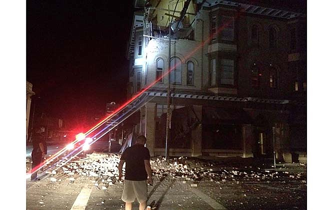 This photo provided by Lyall Davenport shows damage to a building in Napa, Calif. early Sunday, Aug. 24, 2014. Officials say an earthquake with a preliminary magnitude of 6.0 has been reported in California's northern San Francisco Bay area.