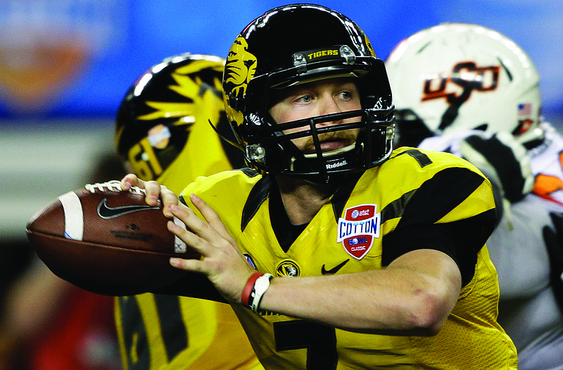 Missouri quarterback Maty Mauk throws the ball against Oklahoma State during the Cotton Bowl earlier this year in Arlington, Texas.