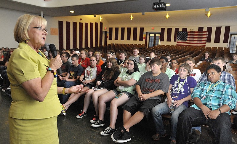 Diane Olson addresses Simonsen freshman students in the Agriculture, Foods and Natural Resources Academy. Olson is the director of promotions and education programs at Missouri Farm Bureau and talked to students about how much agriculture plays a part in their everyday lives. She brought a backpack with a number of items and explained what part of each item was a direct or by-product of agriculture.