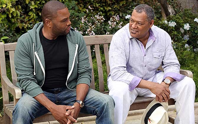 This image released by ABC shows Anthony Anderson, left, and Laurence Fishburne in a scene from the comedy "Black-ish," premiering Sept. 24.