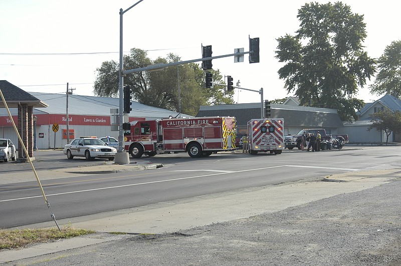 Before the Missouri Highway Patrol arrives in California on Thursday morning, emergency vehicles block off northbound Highway 87 at its intersection with Business 50 after a fatality of an ATV rider.
