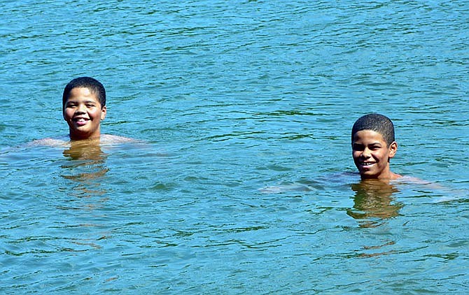 Camdenton R-3 fifth- and sixth-grade students Emmitt and Karmello Reynolds enjoyed a peaceful swim Friday near the spring cove parking lot at Ha Ha Tonka State Park.