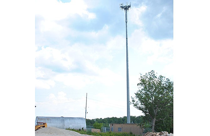 This communications tower near State Route W in Lake Ozark, Mo., is one of the few that will be allowed in the town over the next few months as city officials have placed a six-month moratorium on construction of new towers.