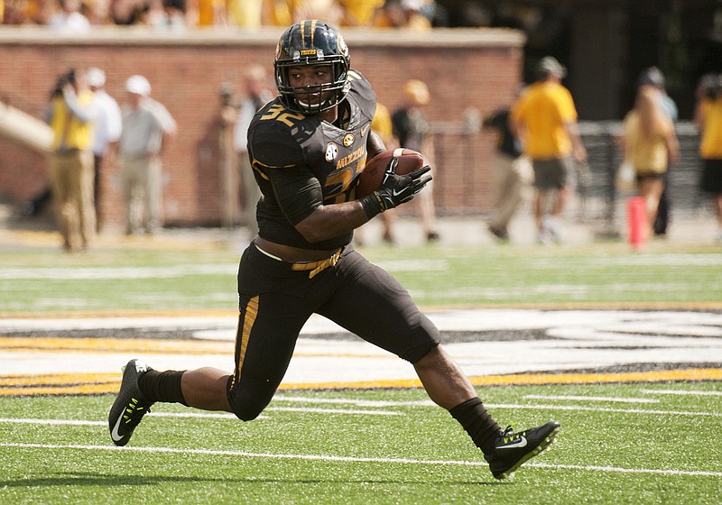 Missouri running back Russell Hansbrough looks for yardage during the second quarter of Saturday's game against South Dakota State at Faurot Field.