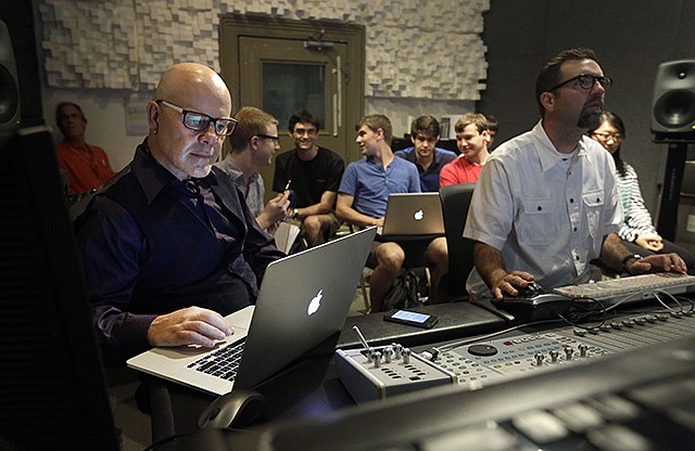 Musician Thomas Dolby, left, prepares for his class, "Sound on Film," at Johns Hopkins University's Peabody Institute music conservatory in Baltimore. Dolby, perhaps best known for his 1980's song "She Blinded Me With Science," has made several careers at the nexus of sound and electronics.