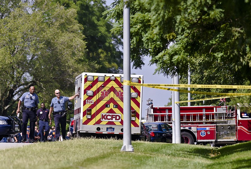 The Kansas City Police Department investigate the scene of a fatal shooting in the Woodbridge neighborhood, Tuesday, in south Kansas City. Three people were killed and two others critically wounded in a shooting in a residential neighborhood in south Kansas City on Tuesday afternoon, and police located a missing SUV hours later several miles away.
