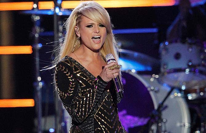 In this June 4, 2014 file photo, Miranda Lambert performs on stage at the CMT Music Awards at Bridgestone Arena in Nashville, Tenn.