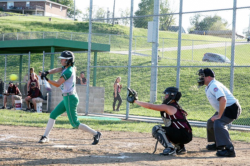 Blair Oaks' Lauren Viessman smacks a base hit during Thursday's game with Eldon at the Falcon Athletic Complex in Wardsville.