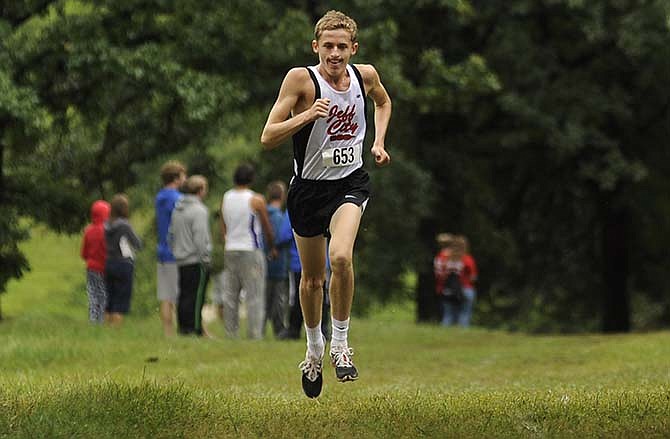 Race leader Jackson Schwartz of the Jays makes his way through the closing stages of the boys varsity event at the Jim Marshall Invitational on Saturday.