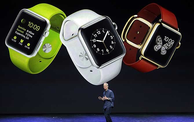 Apple CEO Tim Cook discusses the new Apple Watch on Tuesday, Sept. 9, 2014, in Cupertino, Calif.