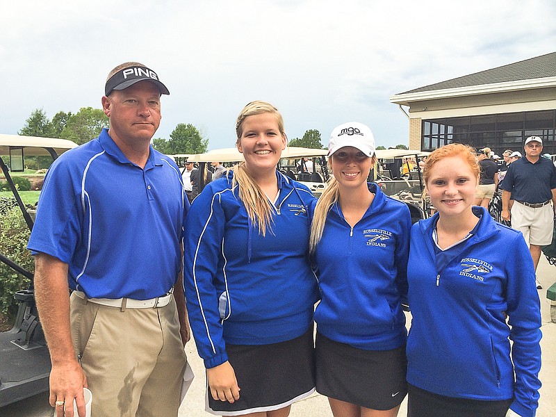 From left are Russellville Lady Indians Golf Coach Jeff Benward, Madie Bungart, Mikala Jungmeyer and Madison Oliver at the Helias Invitational Sept. 3 at Meadow Lake Acres Country Club, New Bloomfield.
