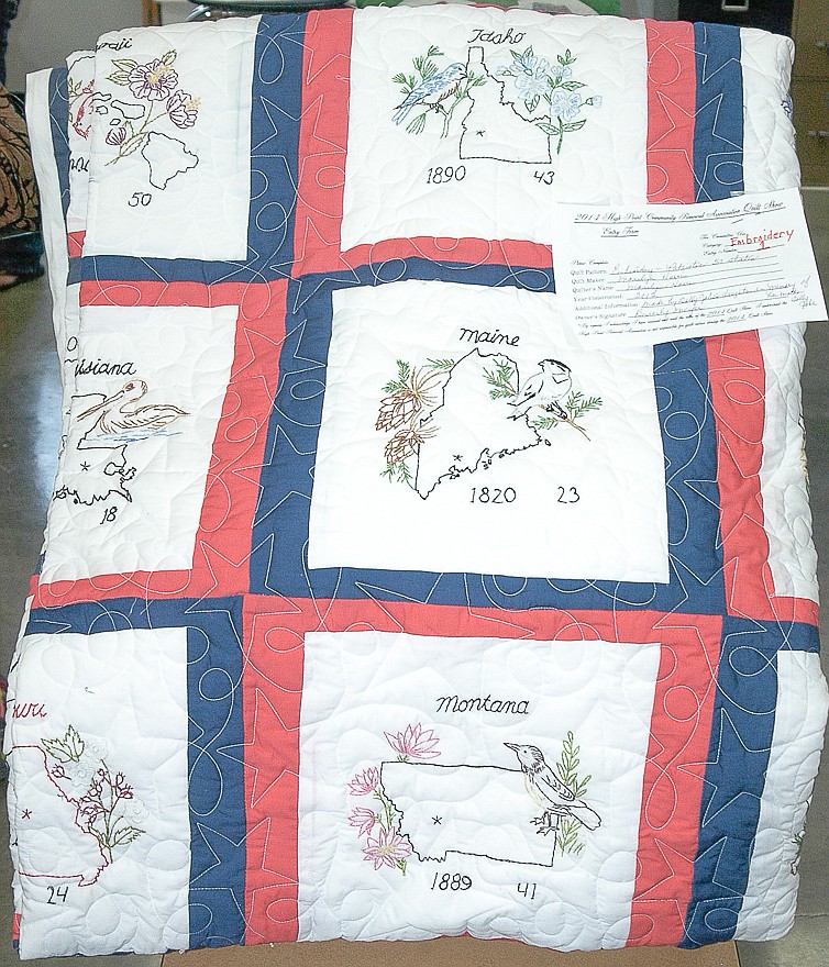 This Embroidered Quilt entered in the High Point Quilt Show, belonging to Bev Meyer, is the category winner.