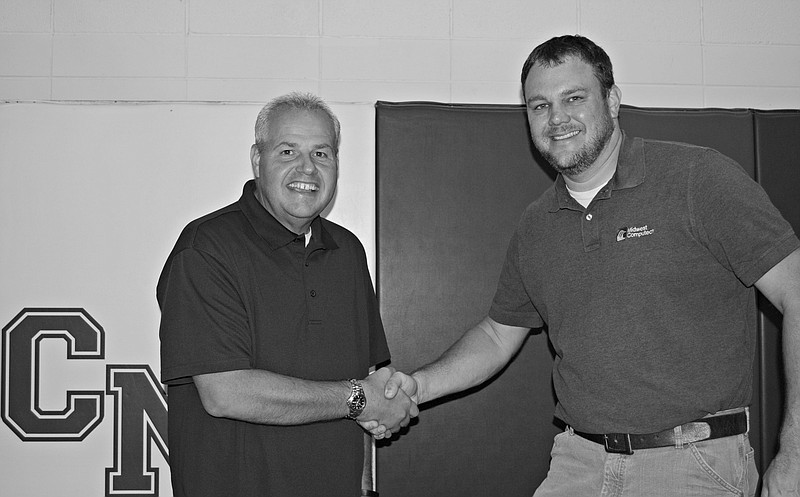 Superintendent Dwight Sanders with Midwest Computech Vice President Clint Miller.