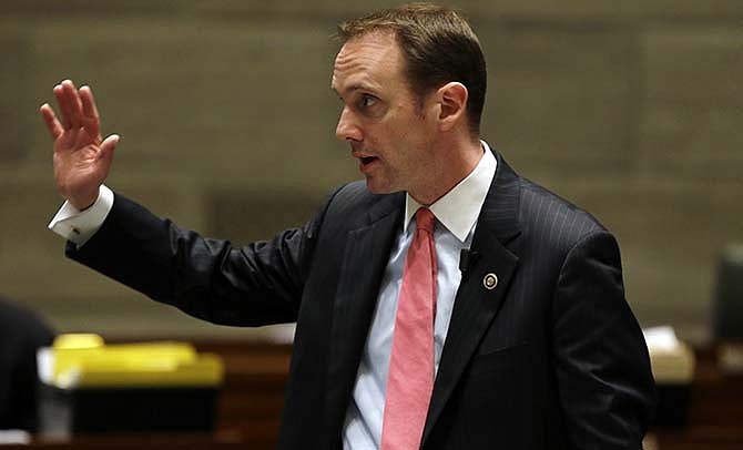 Missouri state Sen. Scott Sifton, D-St. Louis County, speaks on a bill that would allow teachers to carry guns in school Wednesday, Sept. 10, 2014, in Jefferson City, Mo. 