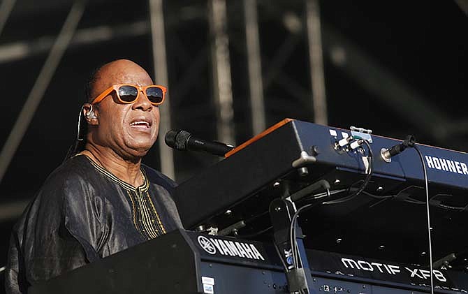 In this June 29, 2014 file photo, US singer Stevie Wonder performs at the Calling festival, in London. 