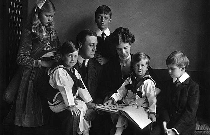 In this June 12, 1919 photo provided by PBS, Franklin and Eleanor Roosevelt pose for a portrait with their children in Washington. Documentary filmmaker Ken Burns', "The Roosevelts: An Intimate History," premieres on PBS as a seven-night, 14-hour extravaganza airing Sunday through Saturday (Sept. 14-20) at 8 p.m. EDT. (AP Photo/PBS, Franklin D. Roosevelt Presidential Library, Hyde Park, NY, Daniel J. White)