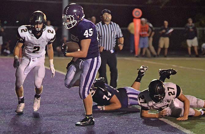 Camdenton running back Josh Martin strolls into the end zone for a touchdown on Sept. 5, 2014, during the Lakers' 31-10 win against the Lebanon Yellowjackets.