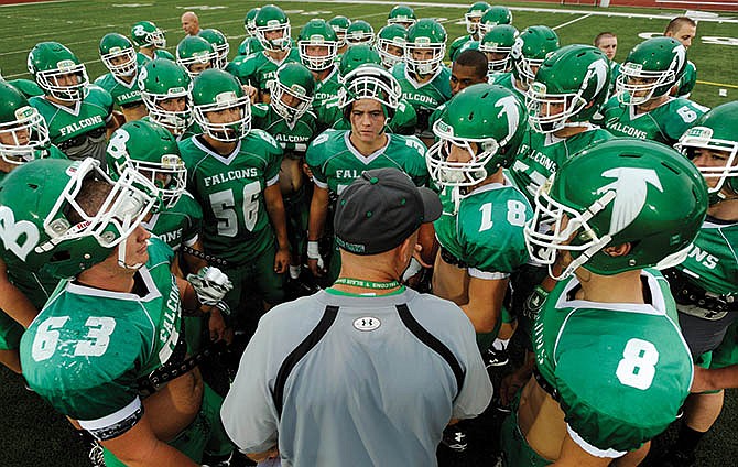 Blair Oaks head coach Brad Drehle tells his team what he expects to see before the Falcons take the field for their
Wednesday afternoon practice session at the Falcon Athletic Complex in Wardsville, Mo.