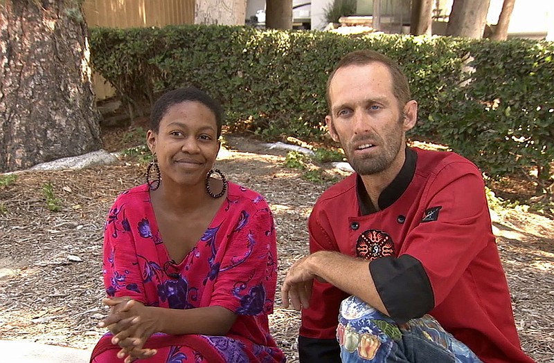 Actress Daniele Watts and Brian Lucas speak during an interview with KABC-TV in Los Angeles. The Los Angeles Police Department said Sunday that officers detained Watts and her companion last week after a complaint that two people were "involved in indecent exposure" in a silver Mercedes.