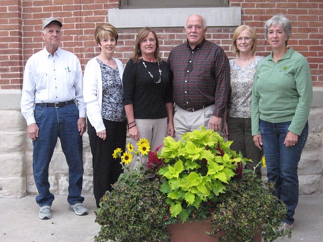 Planter sponsors, Joan and Brian Scrivner center, with members of the California Historic District Organization from left, Tom Winters, Connie Walker and Patty Kay. Alice Longfellow was the supplier of the planters and flowers.