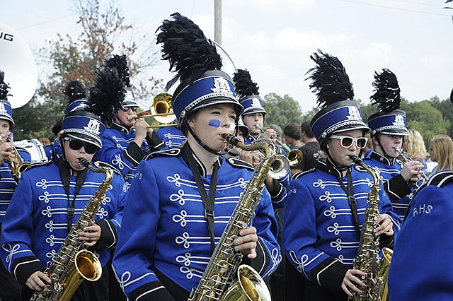 The Russellville High School band led a parade of nearly 340 students from the elementary/middle school building through downtown and to the high school track Friday in celebration of the Russellville School District's outstanding performance on the latest MSIP results.