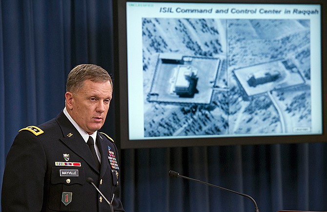 Army Lt. Gen. William Mayville, Jr., Director of Operations J3, speaks about the operations in Syria, Tuesday, Sept. 23, 2014, during a news conference at the Pentagon. In a separate action from the air strikes against the Islamic State group, the U.S. bombed a cell of al Qaida militants in northwestern Syria after concluding they were close to attacking the U.S. or Europe, Pentagon officials say. Mayville, the Pentagon's operations chief, said that the Khorasan Group was nearing "the execution phase of an attack either in Europe or the homeland."