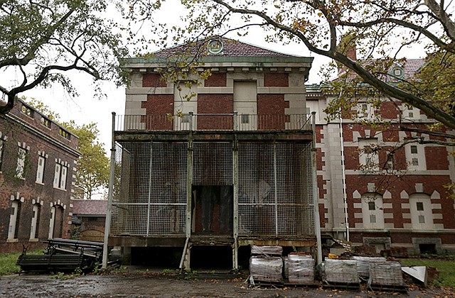A cage covers the front end of the psychiatric ward of the Ellis Island hospital complex on Thursday in New York. The complex, which will be opened to the public on Oct. 1, stopped operating in 1954. In its day, the complex was the largest U.S. Public Health Service institution.