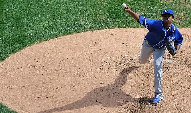 Kansas City Royals starter Yordano Ventura delivers a pitch during the second inning of a baseball game against the Chicago White Sox in Chicago, Sunday, Sept. 28, 2014. 