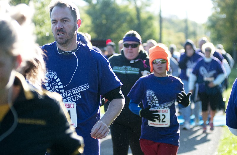 Participants in CARDV's Purple Ribbon Run 5K started the race Saturday morning at Seamen field in Fulton.