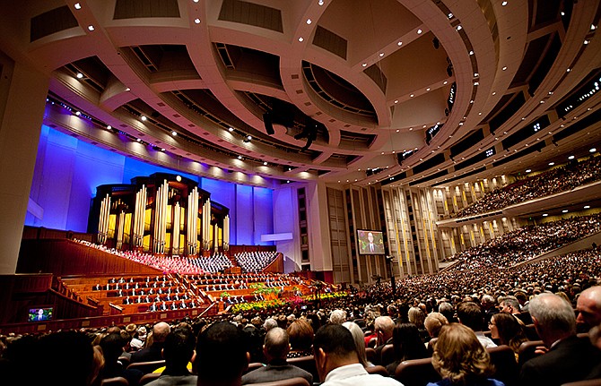 People fill their seats in the Conference Center before the start of opening session of the two-day Mormon church conference Saturday, Oct. 4, 2014, in Salt Lake City. Chi Hong Wong, a Mormon leader from Hong Kong delivered a speech in Cantonese on Saturday in what marked the first time in the history of the faith's signature conference that an address was delivered in a language other than English. 