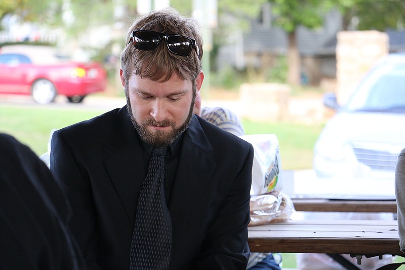 Amon Macvittie awaits his turn to talk at the Callaway County Drug and DWI Courts graduation Monday afternoon at Veterans Park in Fulton. Macvittie was in the program for one year.