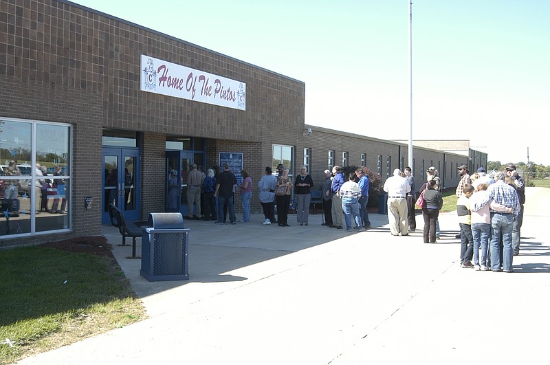 At the California Chapter FFA Barbecue Sunday, Oct. 5, 2014, patrons are lined up outside the entrance to the school.