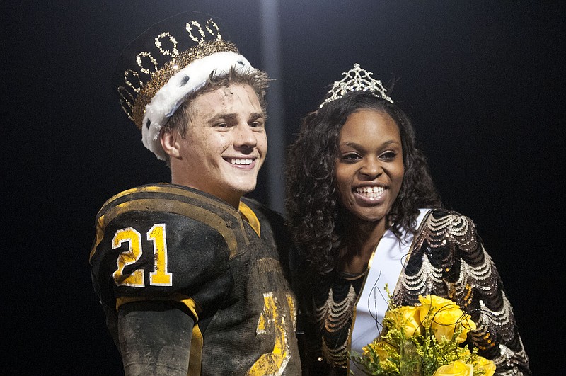 Fulton High School students Noah Braun and DaAjahnae Mitchell were named the 2014 Homecoming king and queen Friday night.