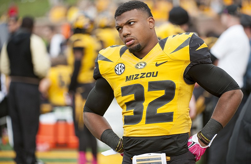 Missouri running back Russell Hansbrough paces the sidelines at the final seconds tick off the clock during Saturday's 34-0 loss to Georgia at Faurot Field.