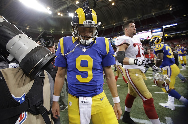 Rams quarterback Austin Davis leaves the field after Monday night's 31-17 loss to the 49ers at the Edward Jones Dome.