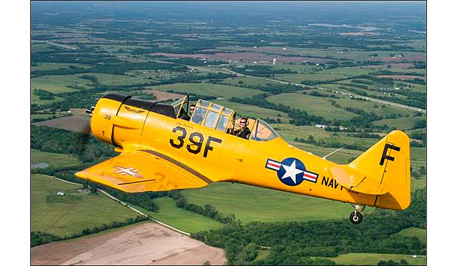 The T-6 Texan, pictured, is one of several planes to be featured at the Jefferson City Airport Open House and Fly-in scheduled for Saturday, Oct. 18, 2014 at the Jefferson City Memorial Airport. 