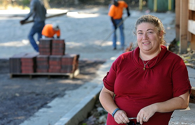 Tia Griffin poses at the work site on Jefferson City's Water Street. Griffin is a city engineer who's been working on this project over the summer.