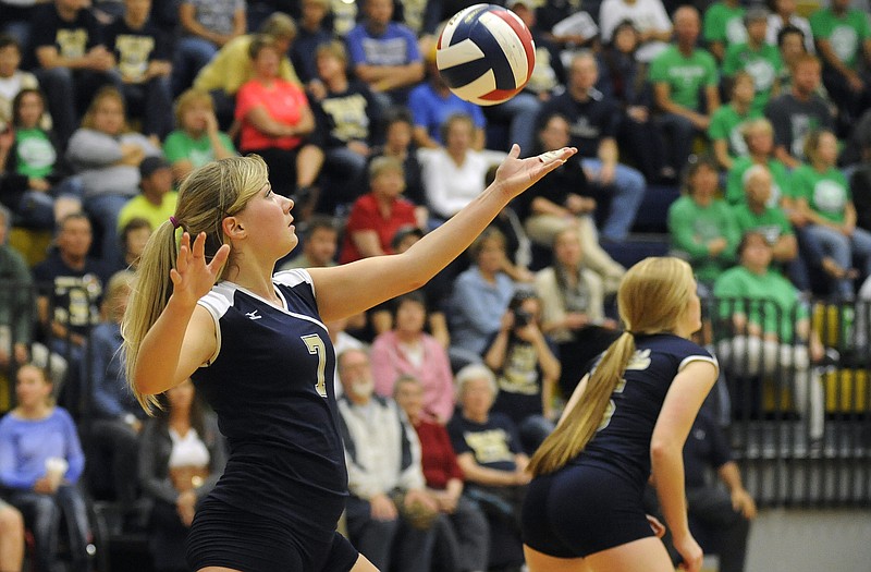 Lindsey Griggs of Helias prepares to serve during Tuesday night's match against Blair Oaks at Rackers Fieldhouse.