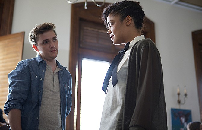 In this image released by Roadside Attractions, Kyle Gallner, left, and Tessa Thompson appear in a scene from "Dear White People."