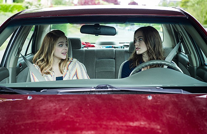 In this image released by A24 Films, Chloe Grace Moretz, left, and Keira Knightley appear in a scene from "Laggies."