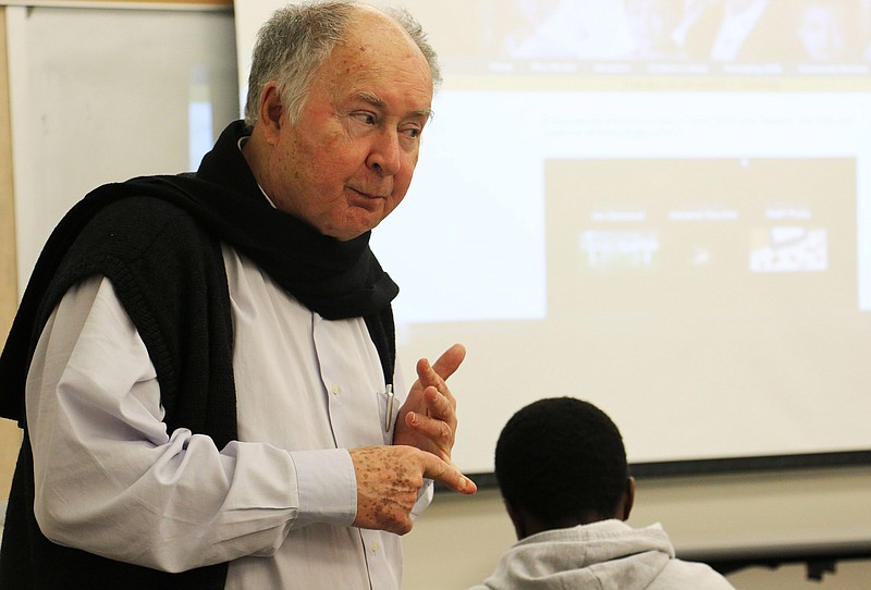 Fr. Joe Maier speaks at Westminster College's library Tuesday night as part of the school's Global Leader in Residence program. He spoke and visited with students Tuesday and will continue to visit with students Wednesday. 