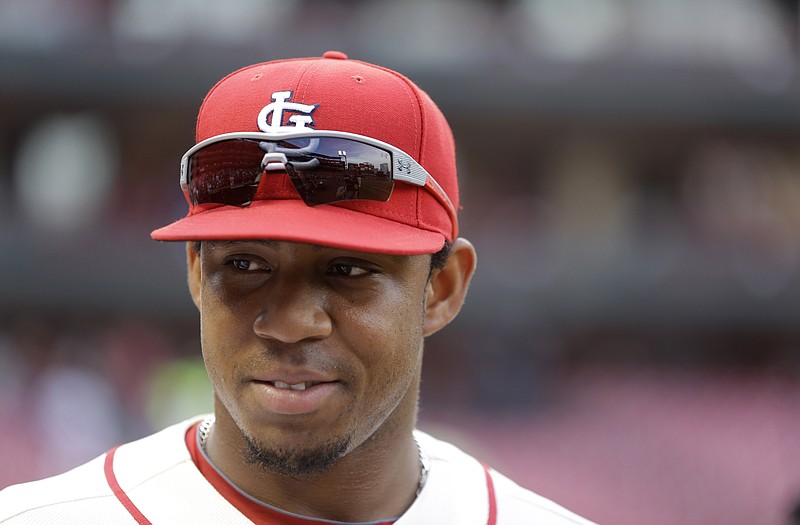 St. Louis Cardinals rookie outfielder Oscar Taveras was killed Sunday along with his girlfriend in a car wreck in the Dominican Republic.