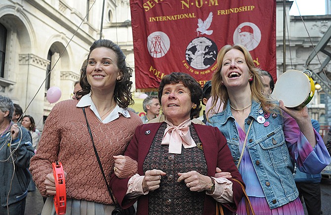 This photo released by CBS Films shows, from left, Liz White as Margaret, Imelda Staunton as Hefina and Nia Gwynee as Gail in a scene from the film, "Pride."