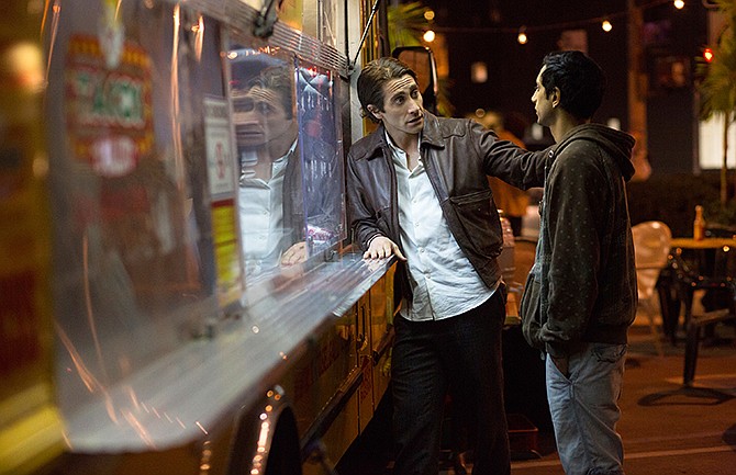 In this image released by Open Road Films, Jake Gyllenhaal, left, and Riz Ahmed appear in a scene from the film, "Nightcrawler."