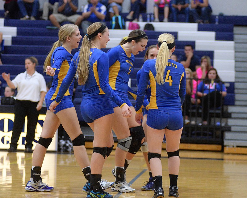 The Fatima Lady Comets, shown here during action earlier this season in Westphalia, are making their third trip in four years to the volleyball Final Four.