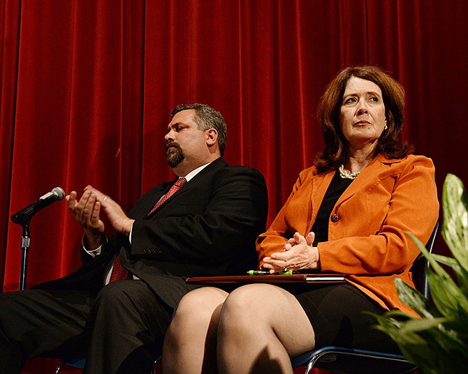 Cole County Judge Pat Joyce, right, and her opponent, Brian Stumpe, sat side by side during Thursday evening's political forum at Pawley Theatre at Lincoln University.