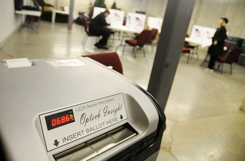 Voters cast their ballots in the box pictured at Fulton City Hall on Tuesday. By 5:30 p.m., 686 people voted.