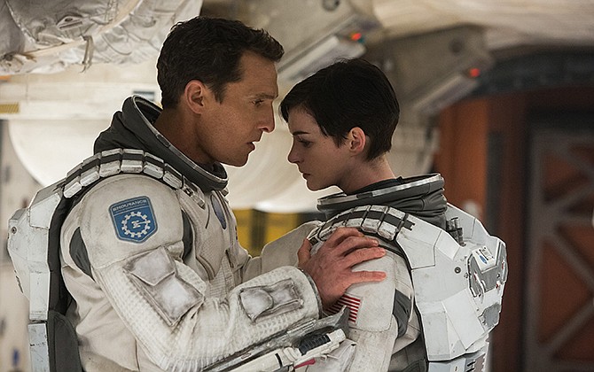 This photo released by Paramount Pictures shows, Matthew McConaughey, left, and Anne Hathaway, in a scene from the film, '"Interstellar," from Paramount Pictures and Warner Brothers Pictures, in association with Legendary Pictures. 