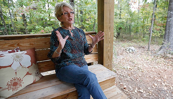 Mary Jane Kennedy, sitting in her Brandon, Miss., backyard, Nov. 5, 2014, is a mother of two gay sons and believes that God loves them like everyone else and feels there is a need for people of faith especially in the Deep South, to envelop gays, lesbians, and transgender people, The Washington-based Human Rights Campaign is taking on the region's longstanding church-based opposition to homosexuality in a series of television commercials, direct-mail messages and phone-bank operations. Commercials will feature people like Kennedy, who's led Bible studies in her native Mississippi for decades.