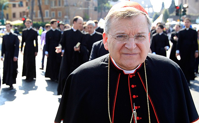 This May 13, 2012 file photo shows Cardinal Raymond Leo Burke, of the United States, taking part in an anti-abortion march in Rome. American Cardinal Raymond Burke, a fervent opponent of abortion and gay marriage, was removed by Pope Francis from another top Vatican post on Saturday. The removal of Burke as head of the Holy See's supreme court was widely expected in church circles.